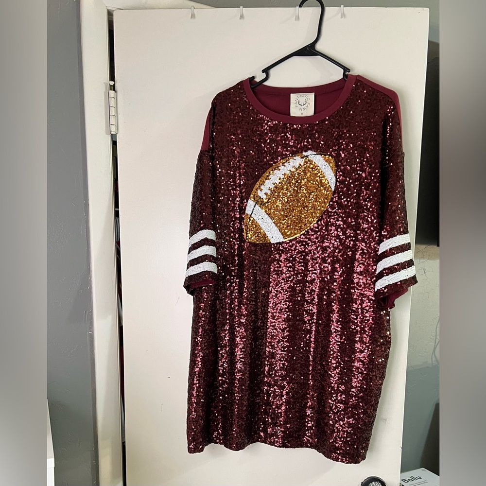 Medium oversized sequin football shirt dress.